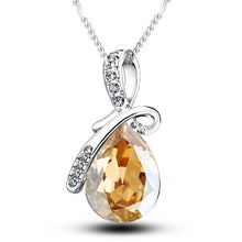 Teardrop CZ crystal pendant necklace with vibrant stones for wedding guest outfits, dinner dates, and fashionable everyday use.