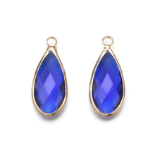 Teardrop glass charms for necklace making, earring crafting, and decorative jewelry projects.