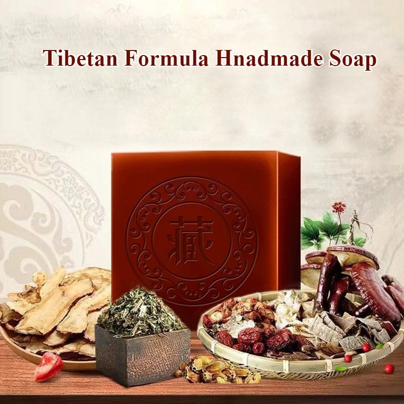 Tibetan Herbal Handmade Black Soap with natural herbs and ingredients on wooden display surface.