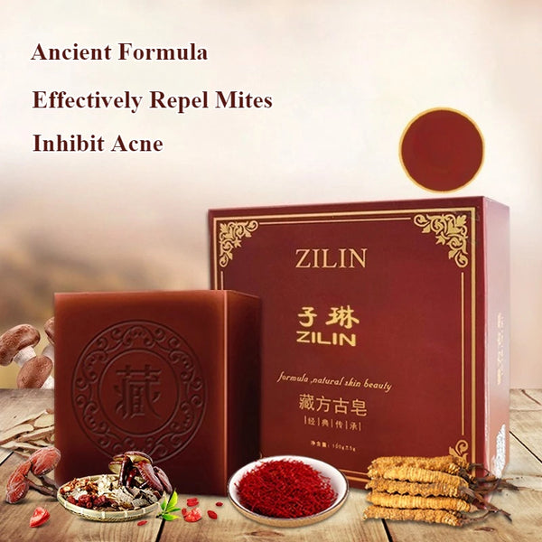 Tibetan Herbal Handmade Black Soap packaging with natural ingredients listed on wooden surface.