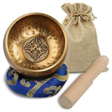 Small 8cm Tibetan meditation bowl with stick for calming the mind, meditation, and wellness practice.