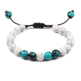 Black Lava Stone & Tiger Eye Crown Bracelet stretch bracelet for meditation, protection, and daily wrist styling.