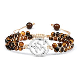 Tiger Eye gemstone wrist bracelet with charm for everyday accessorizing, crystal-inspired fashion, and layered bracelet wear.