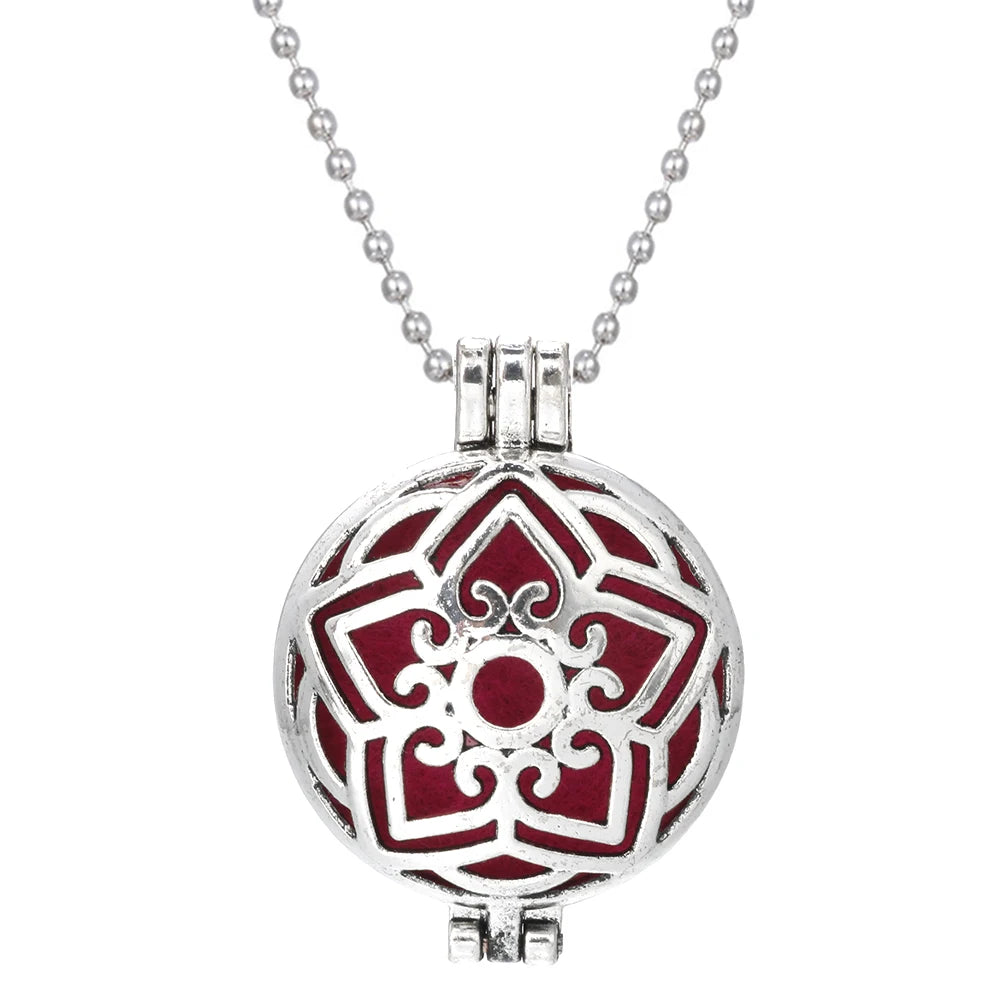 Tree of Life meditation diffuser necklace pendant for essential oil aromatherapy during prayer, mindfulness, and calming practice.