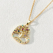 Tree of Life crystal family keepsake necklace with pendant for cherished wear, symbolic fashion, and memory-focused gifts.