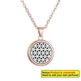 Tree of Life essential oil pendant necklace for holding fragrance oils during meditation and daily calming wear.
