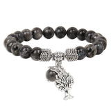 Tree of Life natural bead bracelet for layering with other bracelets, daily outfit styling, and spiritual jewelry wear.