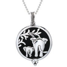 Tree of Life relaxation diffuser necklace for wearing essential oils during quiet moments, meditation, and stress relief practice.