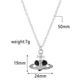 Trendy Silver Heart & Saturn Pendant jewelry piece for modern fashion wear, special occasions, and trend-forward styling.