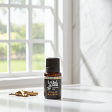 Tribal Soul Palo Santo aroma oil shown in a bottle for calming scent and aromatic use.