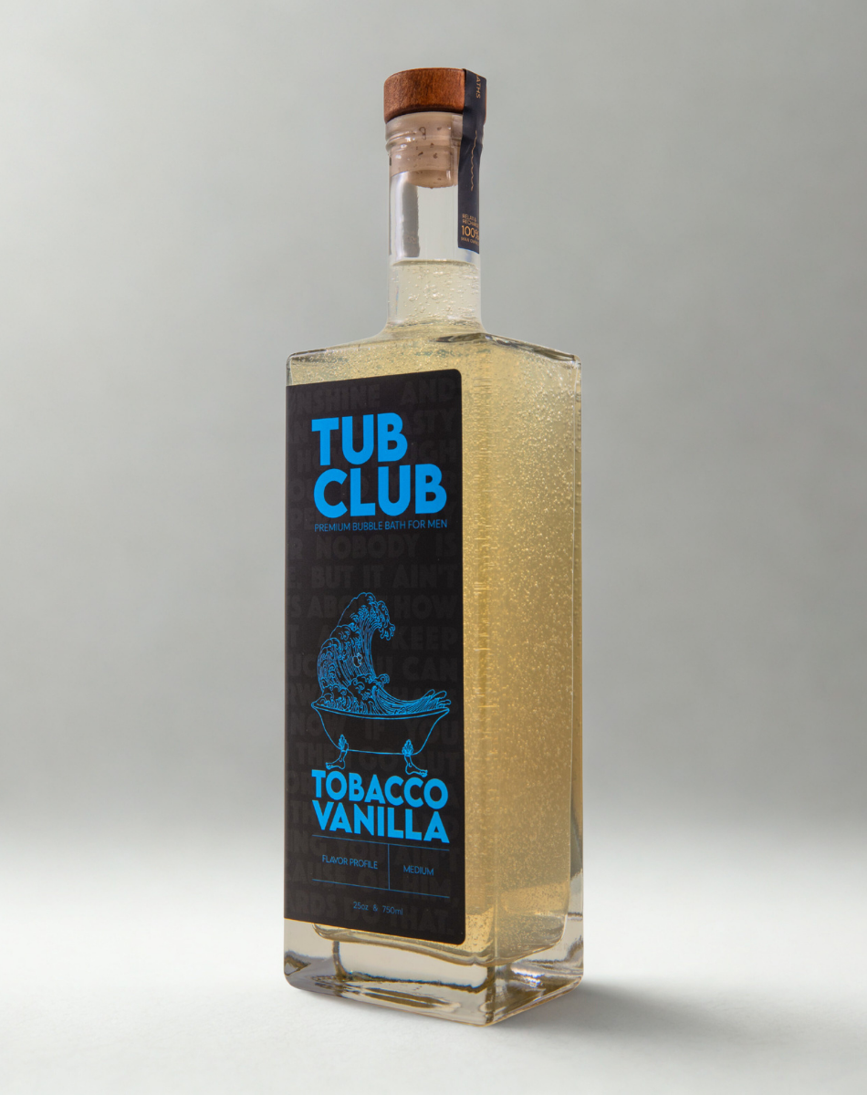 Tub Club Tobacco Vanilla bubble soak bottle for warm bath soaking, foaming bathwater, and personal care use.