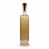 Tub Club Tobacco Vanilla black glass bottle bubble soak for sophisticated bathing, self-care gifting, and evening rituals.