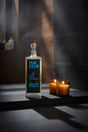 Tub Club Tobacco Vanilla bubble soak in black glass bottle for luxurious bathing, relaxation, and self-care.