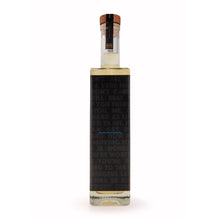 Tub Club Tobacco Vanilla bubble soak being poured