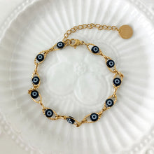 Turkish gold-plated Evil Eye charm bracelet for wrist styling, symbolic protection, and everyday jewelry wear.