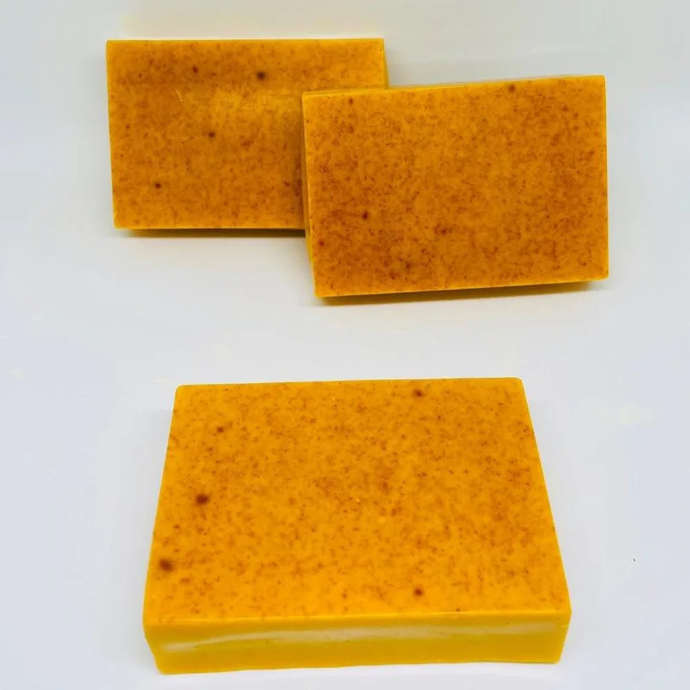 Handmade Turmeric Lemon Kojic Acid Soap 100g bars unlabeled on white background for daily brightening.