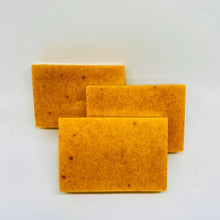 Three Turmeric Lemon Kojic Acid Handmade Soap bars on a clean white background.