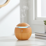 Aroma Essential Oil Diffuser 130ml ultrasonic humidifier for indoor aromatherapy, light humidifying, and soothing room use.
