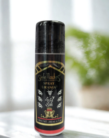 Urania Siete Machos protection spray bottle for clearing negative energy, blessing spaces, and devotional use.