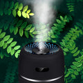 USB Mini Air Diffuser Humidifier with 7 LED colors for adding cool mist moisture, aromatherapy, and ambient lighting in small spaces.