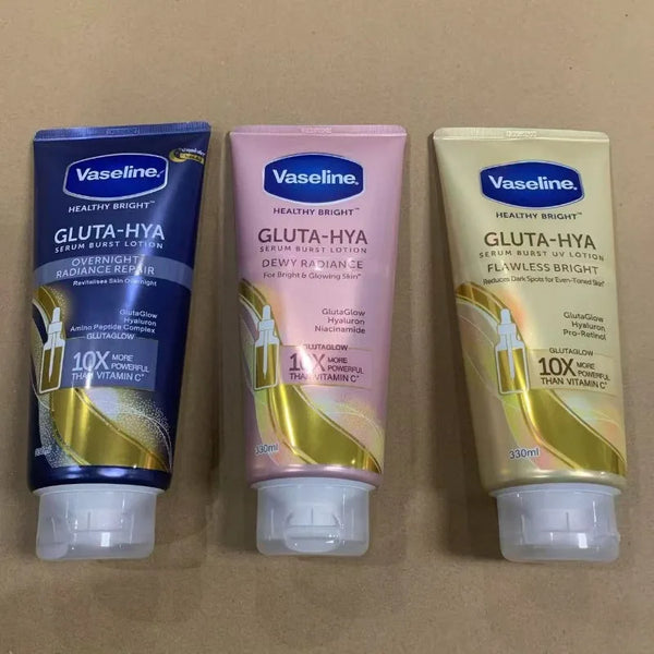 Three Vaseline Niacinamide Body Lotion bottles — Yellow, Pink, and Blue variants — on a cardboard background.