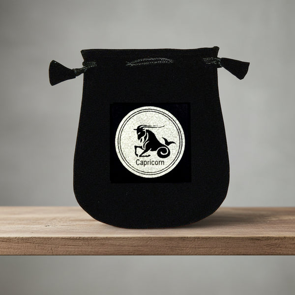 Velvet pouch with Capricorn zodiac symbol embroidery for storing crystals, tarot cards, and small ritual items