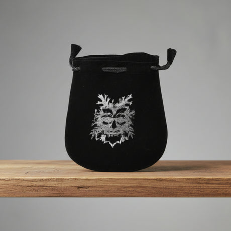 Velvet pouch with Green Man symbol embroidery for storing crystals, tarot cards, and small ritual items