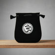 Velvet pouch with Om symbol embroidery for storing crystals, tarot cards, and small ritual items