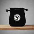 Velvet pouch with Om symbol embroidery for storing crystals, tarot cards, and small ritual items