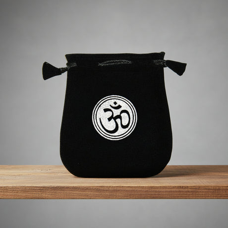 Velvet pouch with Om symbol embroidery for storing crystals, tarot cards, and small ritual items