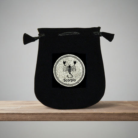 Velvet pouch with Scorpio zodiac symbol embroidery for storing crystals, tarot cards, and small ritual items
