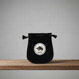 Velvet pouch with Taurus zodiac symbol embroidery for storing crystals, tarot cards, and small ritual items