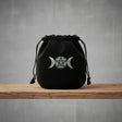 Velvet pouch with Triple Moon and Pentagram symbol embroidery for storing crystals, tarot cards, and small ritual items