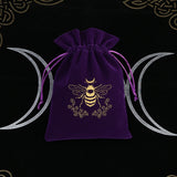 Velvet spiritual card storage drawstring bag for organizing tarot and oracle decks for ritual use and sacred space storage.