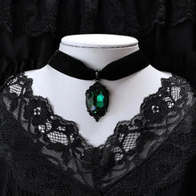 Venom green cameo choker in velvet for gothic costume wear, statement fashion, and dark aesthetic accessorizing.