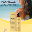 Viareline Deep Moisturizing Body Wash Oil 120ml with packaging and woman in the background for daily skin nourishment.