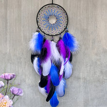Handmade dream catcher wall art with vibrant colorful feathers for room decoration, boho interior styling, and nursery display.