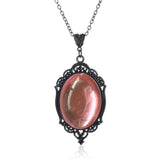 Victorian Gothic Vampire Cameo Necklace with pendant charm for gothic outfits, costume styling, and dark romantic fashion wear.