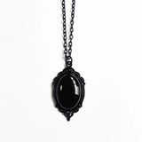 Victorian-style Red & Black Quartz cameo pendant for gothic outfit styling, formal wear, and antique-inspired jewelry collections.