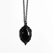 Victorian-style Red & Black Quartz cameo pendant for gothic outfit styling, formal wear, and antique-inspired jewelry collections.