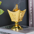 Vintage Arabian Golden Metal incense burner for burning incense during prayer, meditation, and home fragrance use.