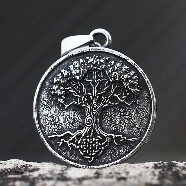 Vintage stainless steel Tree of Life pendant necklace for everyday wear, symbolic jewelry styling, and spiritual gifting.