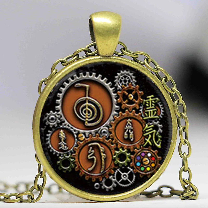 Vintage steampunk Reiki cabochon pendant for spiritual expression, meditation sessions, and daily outfit styling.