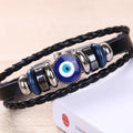Vintage Turkish evil eye leather bracelet for men with braided band for everyday wear, protection symbolism, and casual styling.