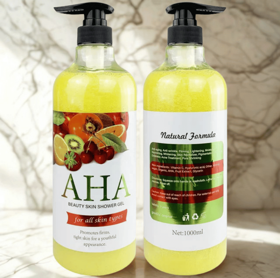 Two bottles of AHA beauty skin shower gel with fruit illustrations on labels.