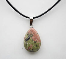 Water-drop gemstone pendant for layering with other necklaces, everyday fashion, and stylish gift use.