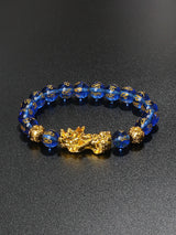 Wealth attraction Pi Xiu Obsidian bracelet for abundance rituals, grounding, and feng shui accessorizing.