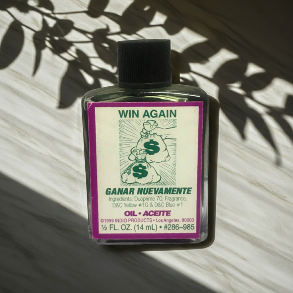 Win Again Wish Oil anointing oil bottle for luck, wish work, and spiritual practice.