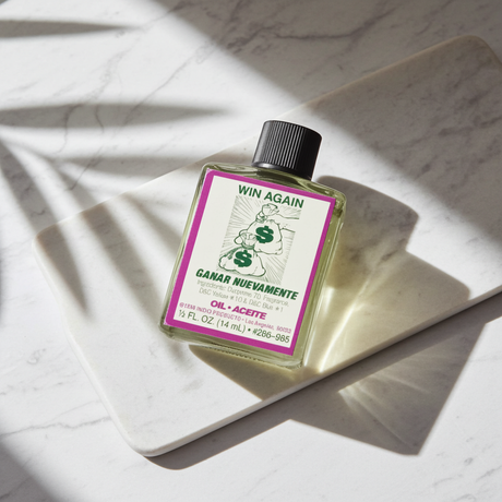 Win Again Wish Oil ritual oil bottle for success, focused intention, and ceremonial use.
