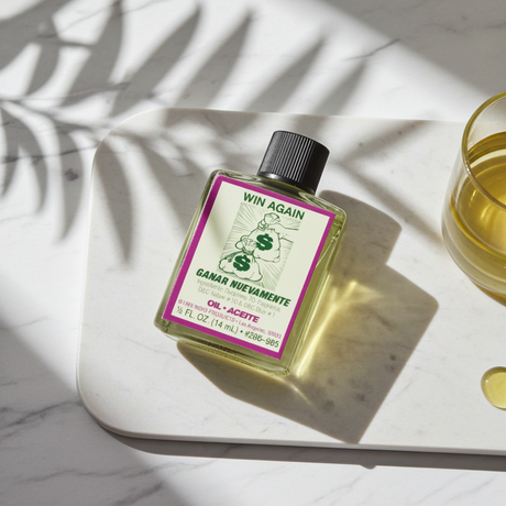 Win Again Wish Oil blessing oil bottle for prayer, wish fulfillment, and spiritual cleansing rituals.